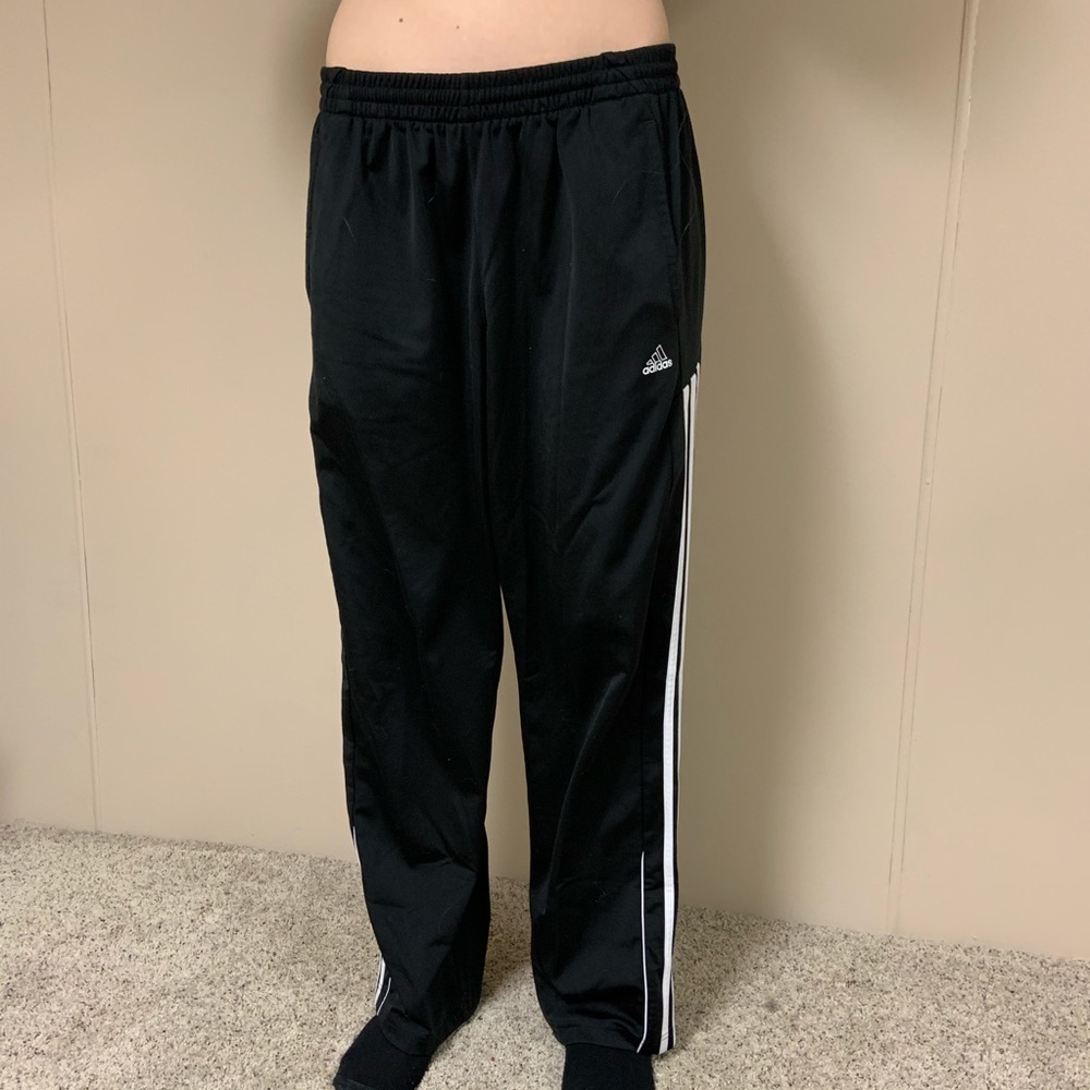 Adidas sweatpants. Black with white stripes.